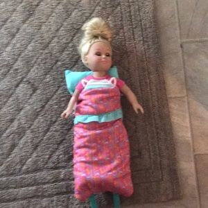 Doll with sleeping bag